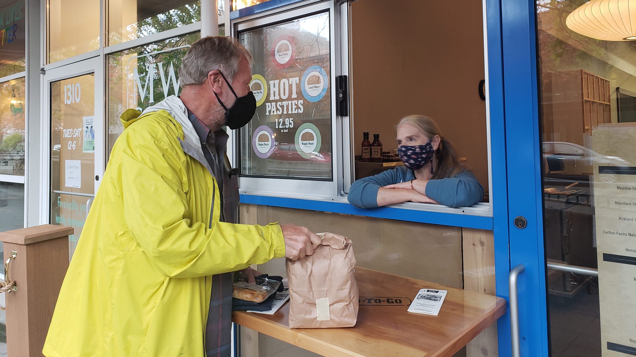 Regular customer picking up frozen pastries from Holly' Meat Pies Bellingham location