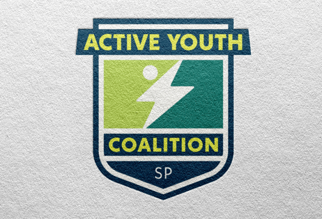 AYC shield logo option showing a stylized person on a green shield